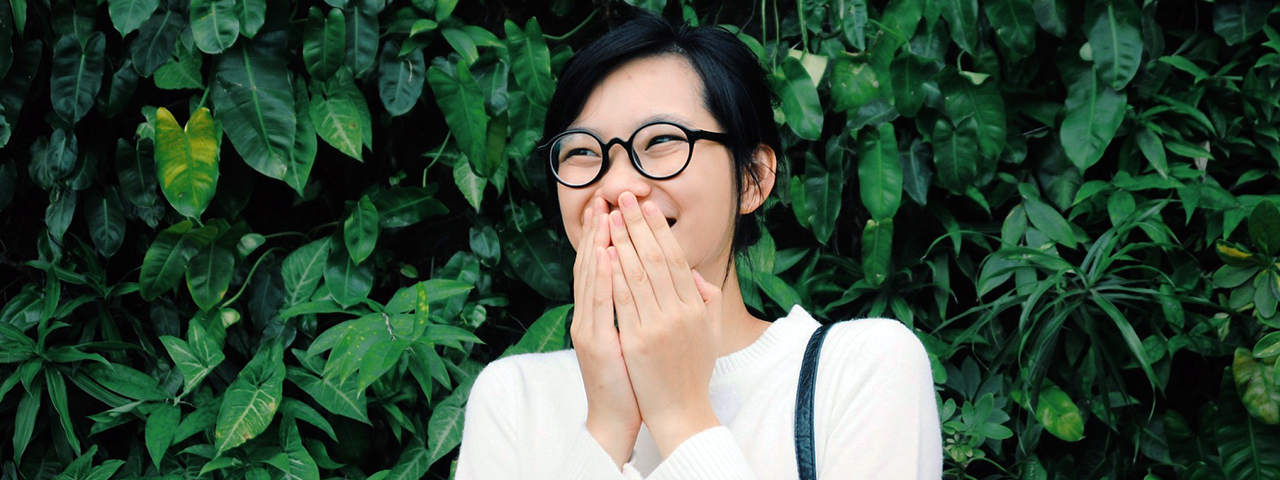Smiling woman with glasses